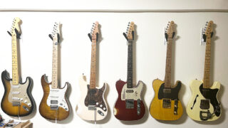 賃貸の壁にギター用壁掛けハンガー壁美人でギターを6本掛けている様子